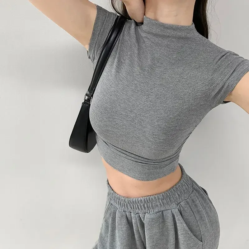 Camiseta corta ajustada con cuello alto para mujer, Tops de Color | Ropa de mujer · Omeda.es - Imagen 25